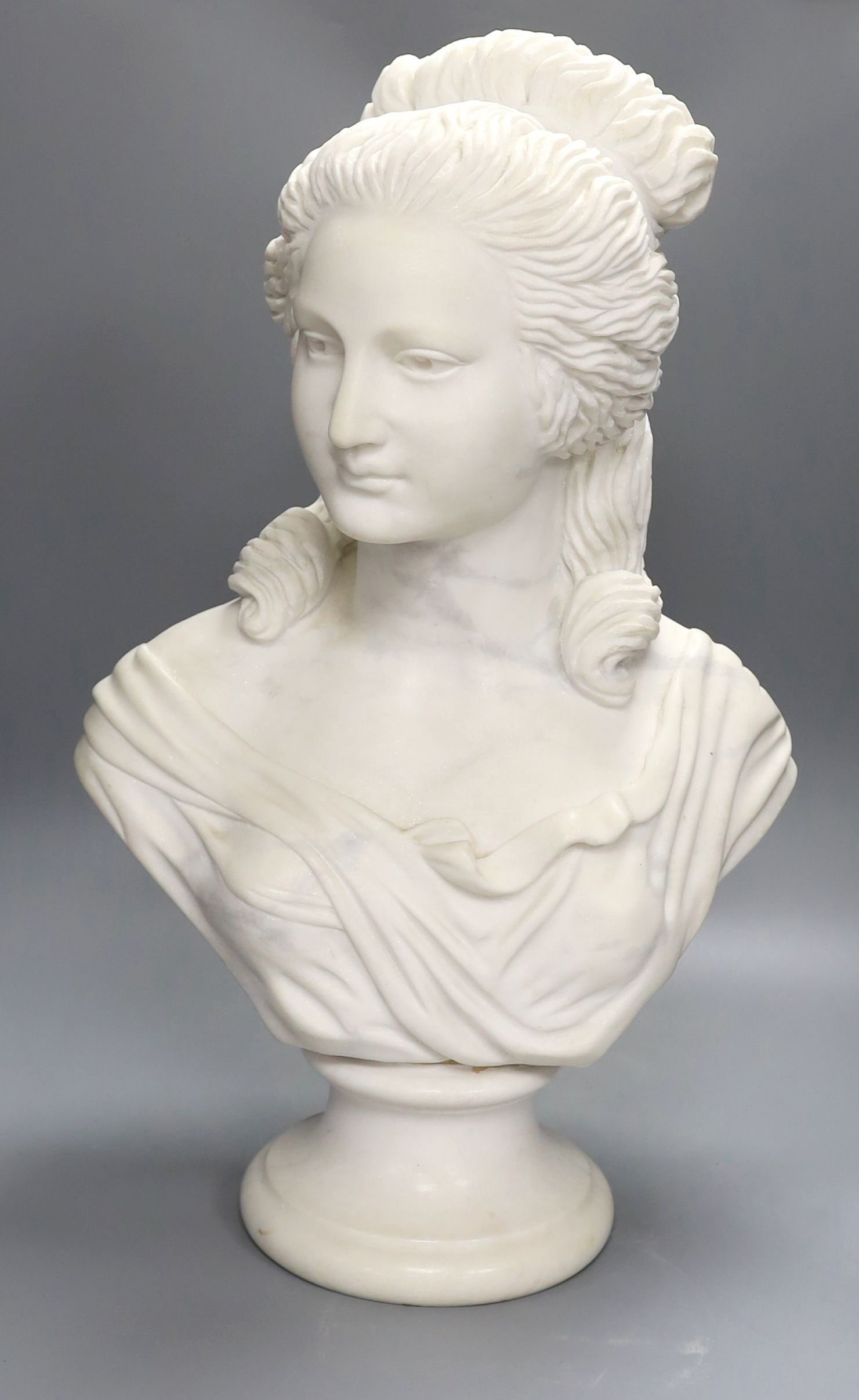 An Italian marble bust of a woman - 61cm high